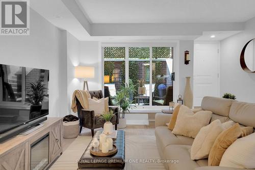 13 - 66 Long Branch Avenue, Toronto, ON - Indoor Photo Showing Living Room
