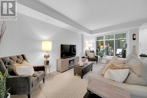 13 - 66 Long Branch Avenue, Toronto, ON - Indoor Photo Showing Living Room