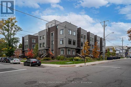 13 - 66 Long Branch Avenue, Toronto, ON - Outdoor With Facade