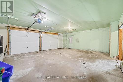 76 Main Street E, Mapleton, ON - Indoor Photo Showing Garage