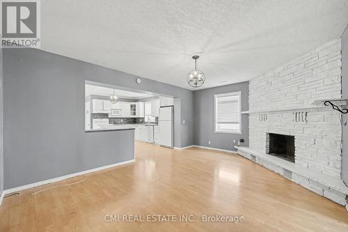 76 Main Street E, Mapleton, ON - Indoor Photo Showing Living Room With Fireplace