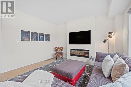 80 Explorer Way, Thorold (Rolling Meadows), ON - Indoor Photo Showing Living Room With Fireplace