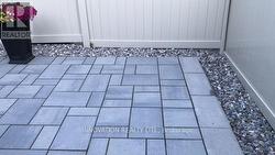 Summer picture of backyard brickwork - 