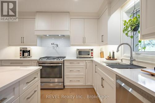 beautiful cabinetry with quartz counters - 74 Montgomery Road, Welland (N. Welland), ON - Indoor Photo Showing Kitchen With Upgraded Kitchen