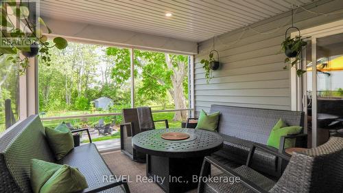 cozy evenings overlooking back gardens - 74 Montgomery Road, Welland (N. Welland), ON - Outdoor With Deck Patio Veranda With Exterior