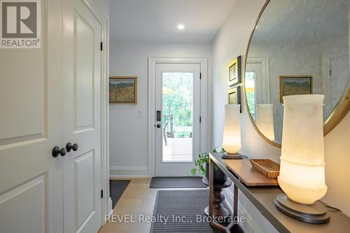 access to rear yard and garage (left) - 74 Montgomery Road, Welland (N. Welland), ON - Indoor Photo Showing Other Room