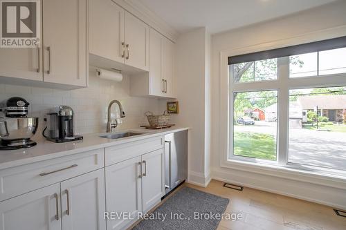 butler's pantry with extra bar fridge - 74 Montgomery Road, Welland (N. Welland), ON - Indoor Photo Showing Kitchen