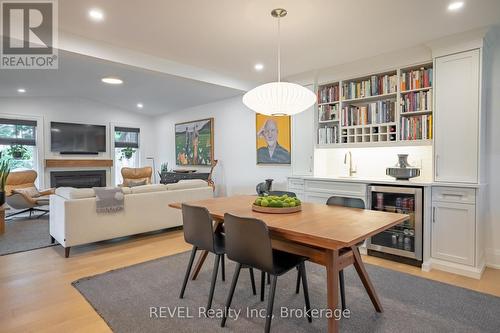 dining room with built in beverage center - 74 Montgomery Road, Welland (N. Welland), ON - Indoor With Fireplace