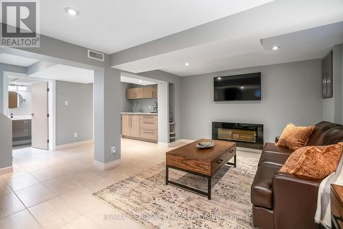 4 Upper Canada Drive, St. Catharines (Lakeshore), ON - Indoor Photo Showing Living Room With Fireplace