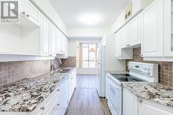 Granite Counter Tops & Ceramic Back Splash - 