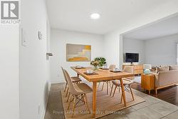 Virtually Staged dining room, shows possibilities - 