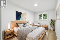 Virtually Staged Bedroom 3; laminate flrs & closet - 