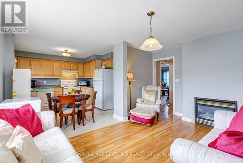 21 Polarlights Way, Toronto, ON - Indoor Photo Showing Living Room With Fireplace