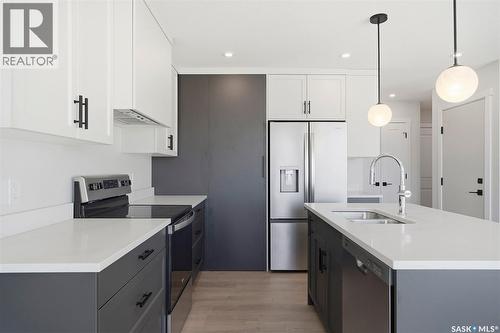 416 155 Mcfaull Way, Saskatoon, SK - Indoor Photo Showing Kitchen With Double Sink With Upgraded Kitchen