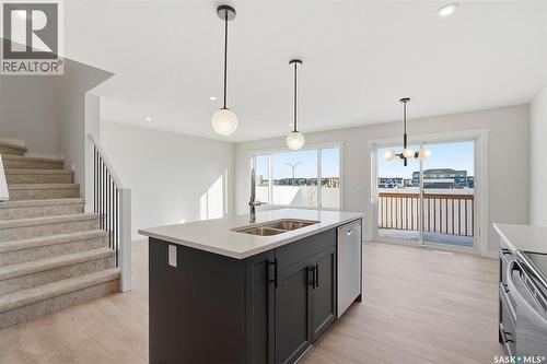 416 155 Mcfaull Way, Saskatoon, SK - Indoor Photo Showing Kitchen With Double Sink