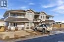 4102 Buckingham Drive E, Regina, SK  - Outdoor With Deck Patio Veranda With Facade 