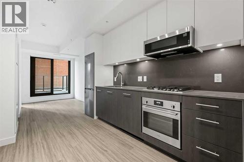 207, 730 2 Avenue SW  Calgary, AB T2P 1R8