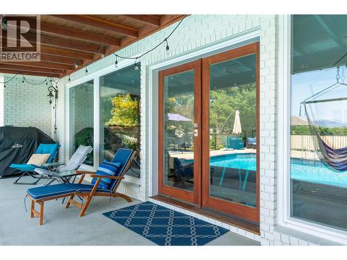 514 Hawes Court, Kelowna, BC - Outdoor With In Ground Pool With Deck Patio Veranda With Exterior