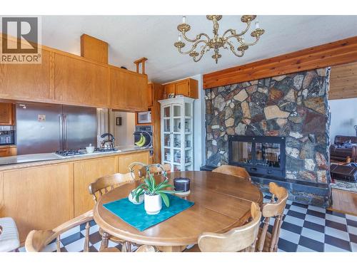164 Cliffview Drive, Enderby, BC - Indoor Photo Showing Dining Room With Fireplace