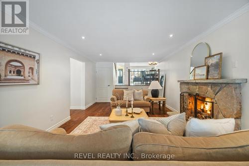 7 Forestwood Drive, Kitchener, ON - Indoor Photo Showing Living Room With Fireplace