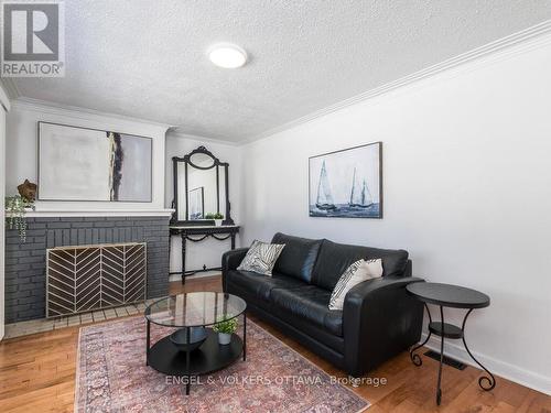 878 Dunlevie Avenue, Ottawa, ON - Indoor Photo Showing Living Room With Fireplace