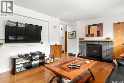 7200 6Th Avenue, Regina, SK - Indoor Photo Showing Living Room With Fireplace
