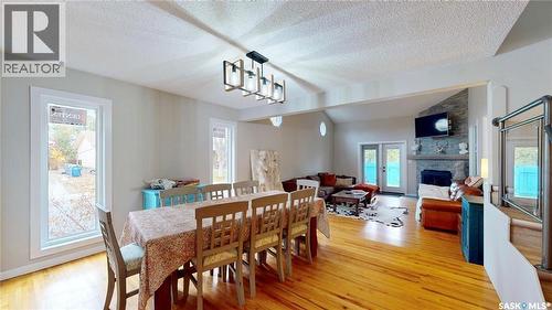 3355 Westminster Road, Regina, SK - Indoor Photo Showing Dining Room With Fireplace
