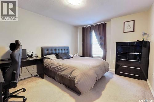 15 3101 Tregarva Drive E, Regina, SK - Indoor Photo Showing Bedroom