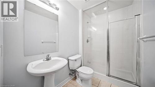 Bathroom featuring tile patterned floors and a stall shower - 388 Prince Of Wales Drive Unit# 1609, Mississauga, ON - Indoor Photo Showing Bathroom