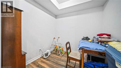 Bedroom with a skylight and dark wood finished floors - 388 Prince Of Wales Drive Unit# 1609, Mississauga, ON - Indoor