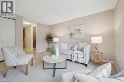 Living room featuring carpet flooring - 