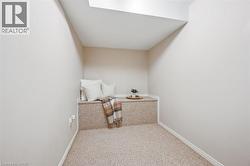 Sitting room with carpet flooring - 