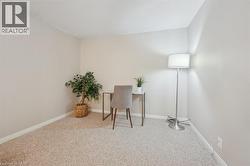 Unfurnished office with carpet and baseboards - 