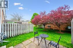 Fenced backyard featuring a patio - 
