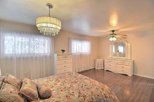 Chambre à coucher principale - 32 Av. De La Plage, Barraute, QC - Indoor Photo Showing Bedroom