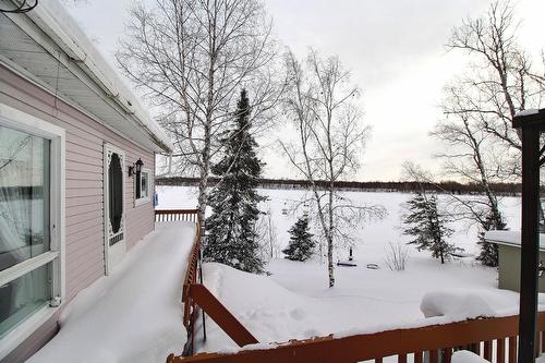 Bord de l'eau - 32 Av. De La Plage, Barraute, QC - Outdoor