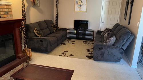 1820 Olympus Way, West Kelowna, BC - Indoor Photo Showing Living Room With Fireplace