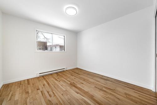 Chambre à coucher - 5-405 Rue Lamarre, Longueuil (Le Vieux-Longueuil), QC - Indoor Photo Showing Other Room