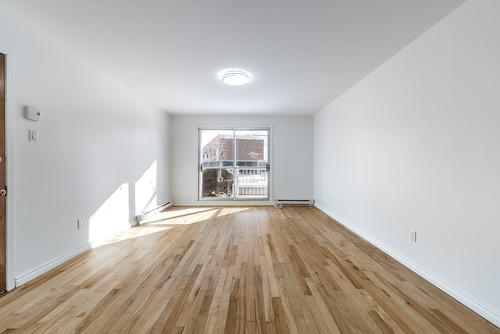 Salon - 5-405 Rue Lamarre, Longueuil (Le Vieux-Longueuil), QC - Indoor Photo Showing Other Room