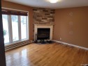 Salon - 13482 Rue Brault, Mirabel, QC  - Indoor With Fireplace 
