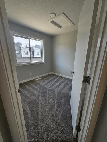 8069-8073  Cedric Mah Rd, Edmonton, AB - Indoor Photo Showing Other Room