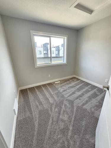 8069-8073  Cedric Mah Rd, Edmonton, AB - Indoor Photo Showing Other Room