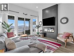 gas fireplace, lots of windows - 