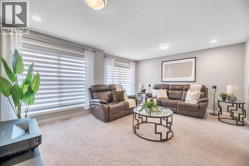 63 Walgrove Way Se, Calgary, AB - Indoor Photo Showing Living Room