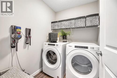 63 Walgrove Way Se, Calgary, AB - Indoor Photo Showing Laundry Room