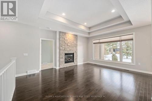 2205 Jack Nash Drive, London South (South A), ON - Indoor With Fireplace
