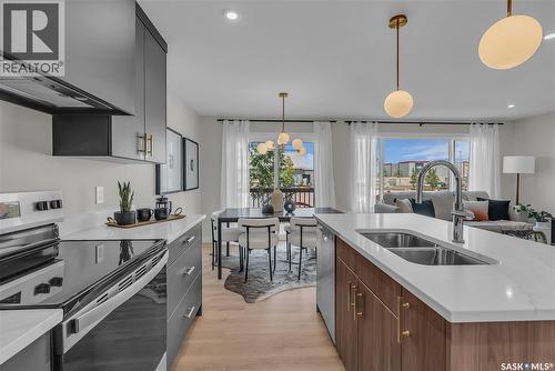 138 155 Mcfaull Way, Saskatoon, SK - Indoor Photo Showing Kitchen With Double Sink With Upgraded Kitchen