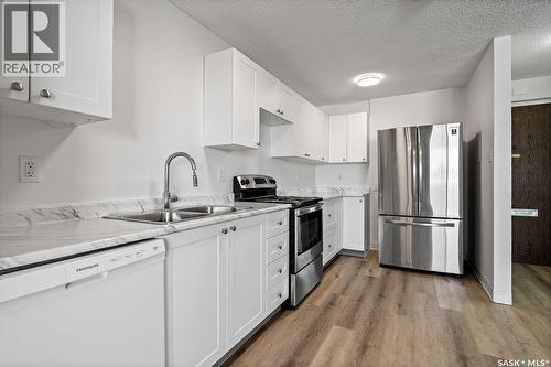 207 4615 Rae Street, Regina, SK - Indoor Photo Showing Kitchen With Double Sink