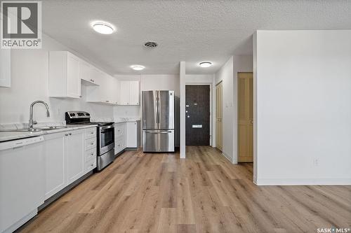 207 4615 Rae Street, Regina, SK - Indoor Photo Showing Kitchen With Double Sink With Upgraded Kitchen