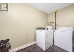 In unit laundry and HWT.  Access to crawl space - 